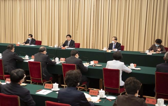 紀念中共中央發布“五一口號”75周年座談會在京舉行 王滬寧出席并講話